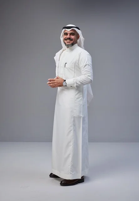 Saudi Man in Traditional Thobe Standing in Studio