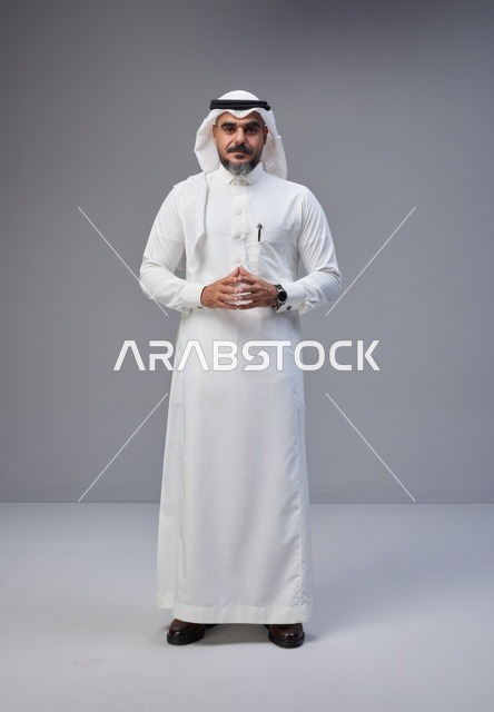 Saudi Man in Traditional Thobe Standing in Studio