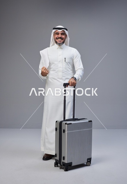 Saudi Man in Traditional Thobe with Travel Suitcase