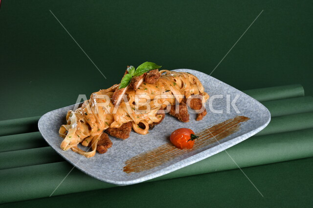A plate of spaghetti noodles with delicious red sauce, a plate of spaghetti noodles illustrated on a green background, chroma, arabic fast food, fast food, delicious food