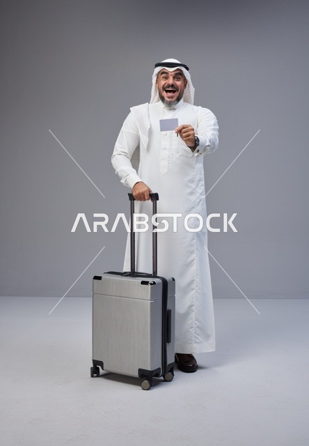 Saudi Man with Suitcase and Credit Card for Travel
