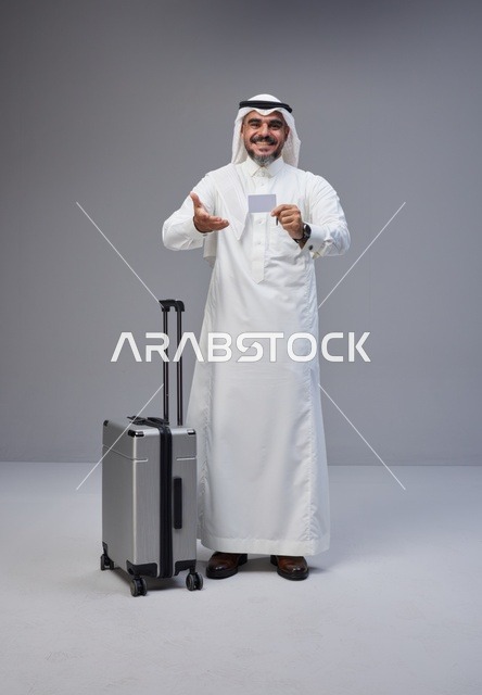 Saudi Man with Suitcase and Blank Card for Travel Banking