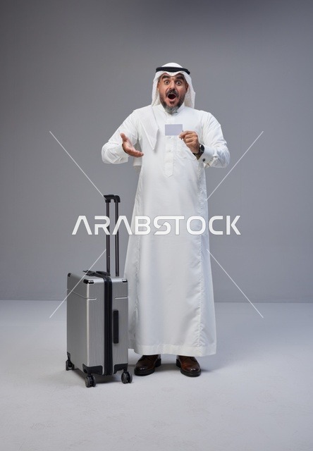 Saudi Man with Suitcase and Credit Card