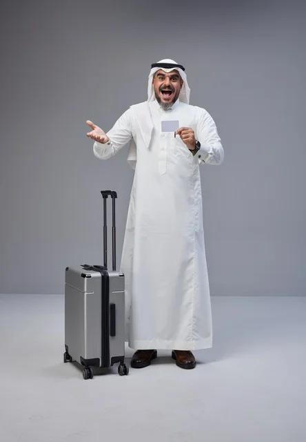 Saudi Man with Suitcase and Credit Card in Studio