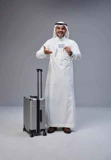 Saudi Man with Suitcase and Credit Card Studio Shot