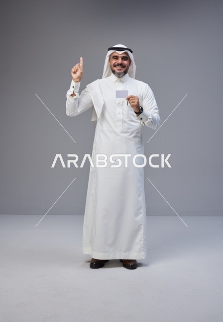 Saudi Man in Traditional Thobe Holding Blank ID Card