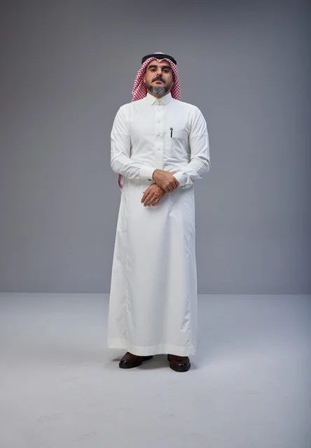 Saudi Man in Traditional Thobe and Shemagh Portrait