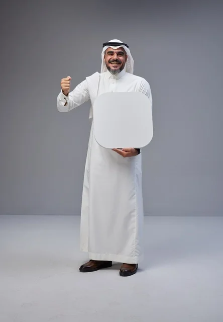 Saudi Man Holding Blank White Signboard in Studio