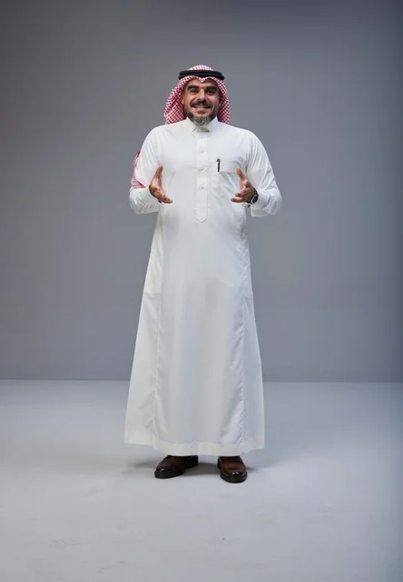Saudi Man in Traditional Dress Gesturing in Studio
