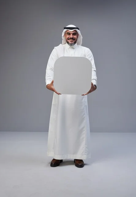 Saudi Man in Traditional Thobe Holding Blank Board