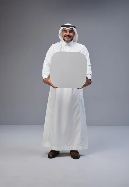 Saudi Man Holding Blank White Board Mockup in Studio