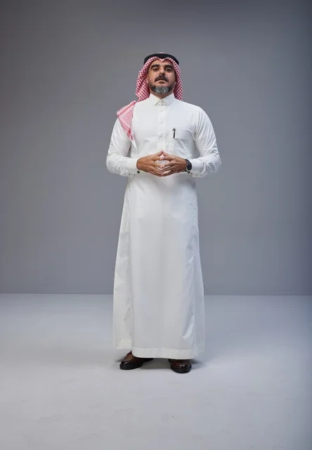 Saudi Man in Traditional Thobe Standing in Studio