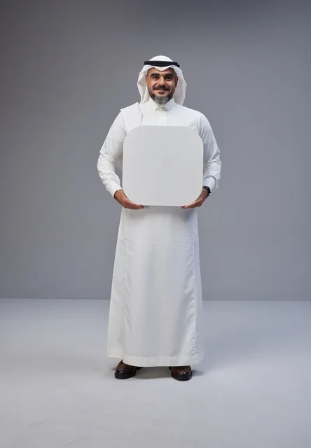 Saudi Man Holding Blank White Board in Studio