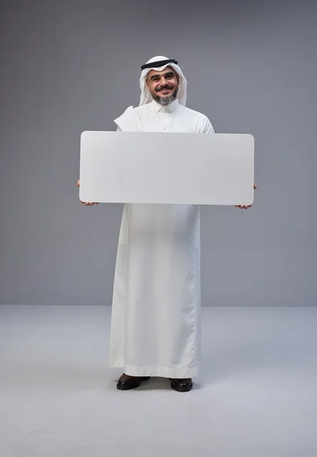 Saudi Man Holding Blank White Board in Studio