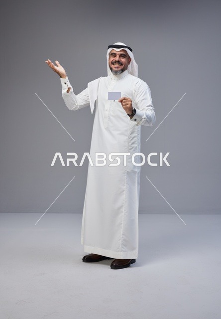 Saudi Man in Traditional Thobe Holding Blank ID Card