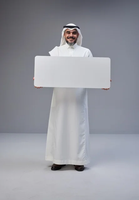 Saudi Man Holding Blank White Sign in Studio