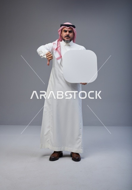 Saudi Man Holding Blank White Board with Thumbs Down