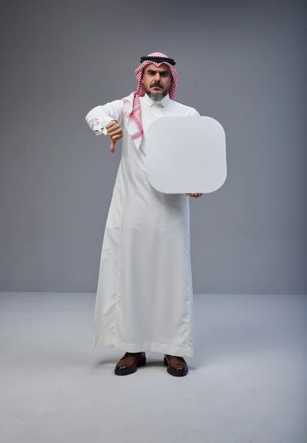 Saudi Man Holding Blank White Board with Thumbs Down