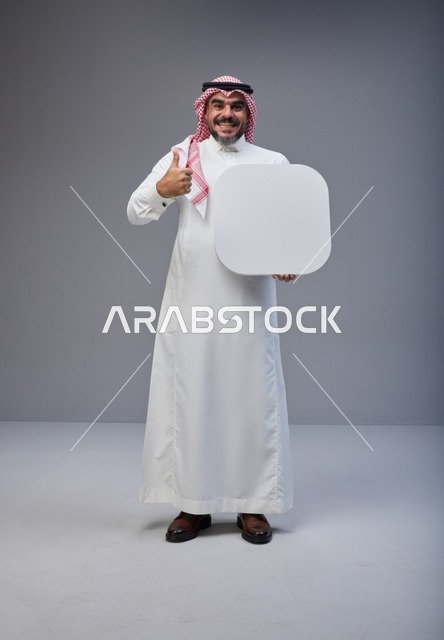 Saudi Man Holding Blank White Board with Thumbs Up