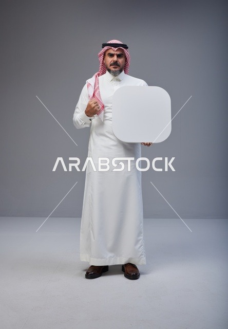 Saudi Man Holding Blank White Board in Studio