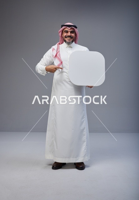 Saudi Man Holding Blank White Board in Studio
