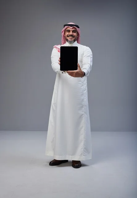 Saudi Man Holding Tablet Blank Screen Studio Shot