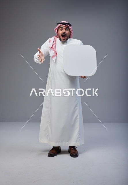 Surprised Saudi Man Holding Blank White Board Studio