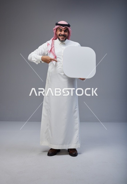 Saudi Man Holding Blank White Signboard in Studio