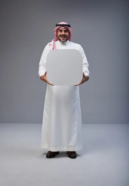 Saudi Man Holding Blank White Sign in Studio