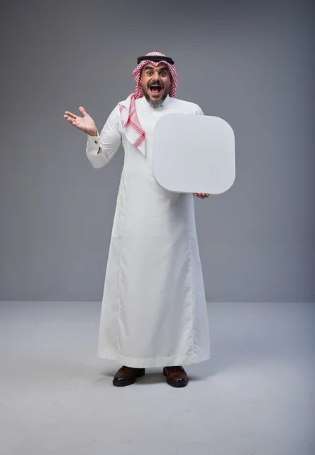 Saudi Man in Traditional Thobe Holding Blank White Board