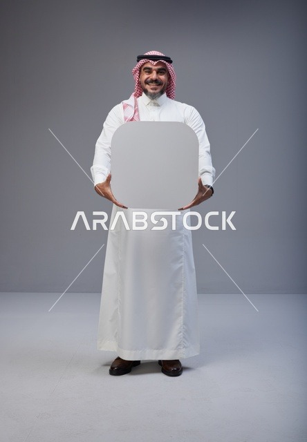 Saudi Man Holding Blank White Board in Studio