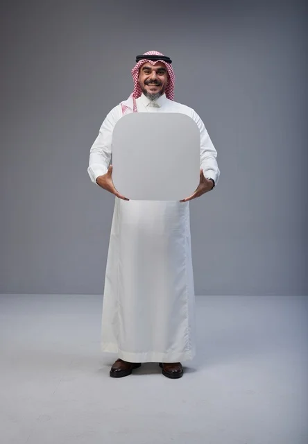 Saudi Man Holding Blank White Board in Studio
