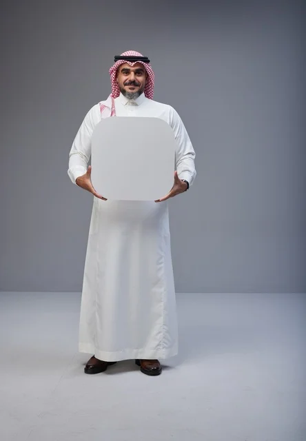 Saudi Man Holding Blank White Board in Studio