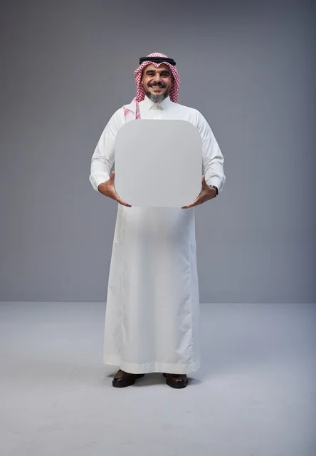 Saudi Man Holding Blank White Board in Studio