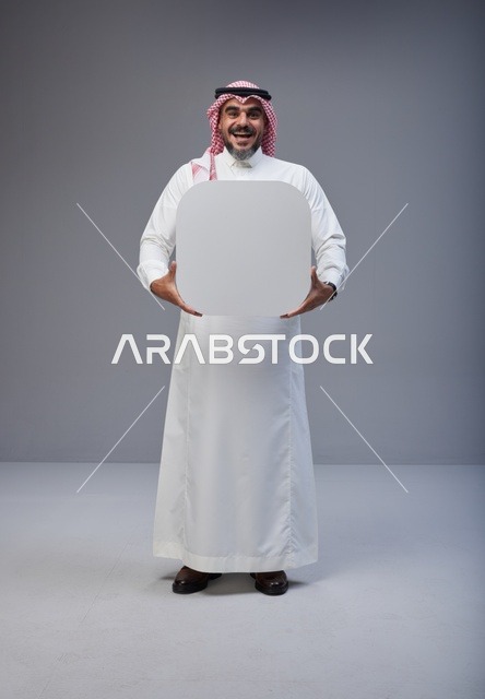 Saudi Man Holding Blank White Sign Board in Studio