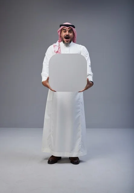 Surprised Saudi Man Holding Blank White Sign Board