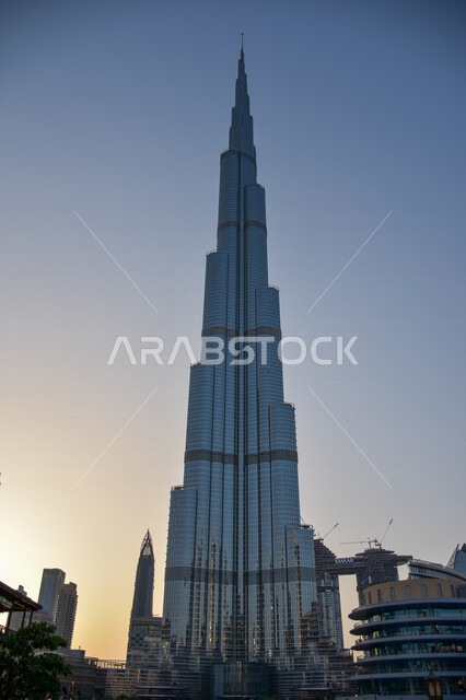 A picture of Burj Khalifa at sunset in Dubai, urban development, the highest skyscrapers in Dubai, famous Emirates landmarks, tourism in the United Arab Emirates