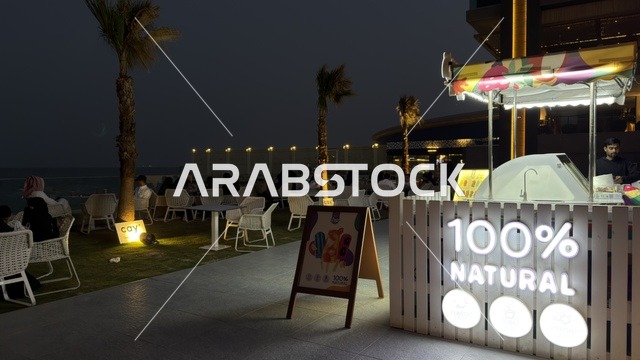 مجمع مطل الخبر جلسات خارجية واجهة بحرية ليلاً