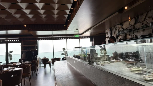 The interior design of a luxury restaurant in a complex overlooking Khobar.