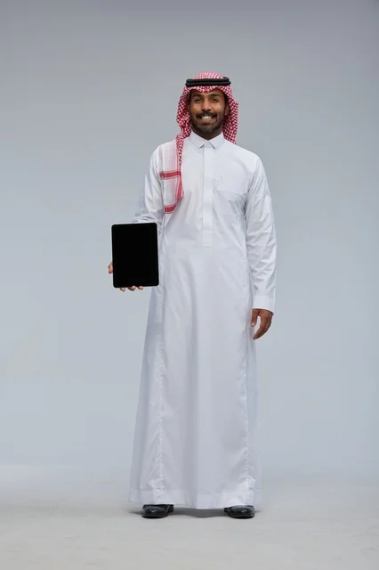 Saudi Man Holding Digital Tablet with Blank Screen