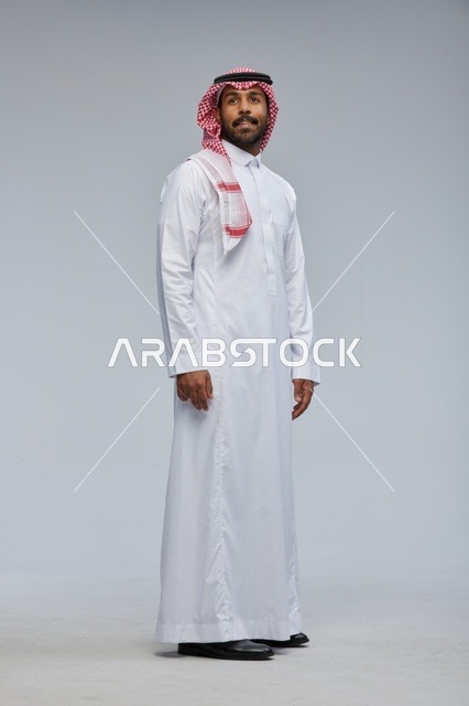 Saudi Man in Traditional Thobe and Shemagh Studio Shot