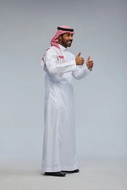Saudi Man in Traditional Dress Giving Double Thumbs Up