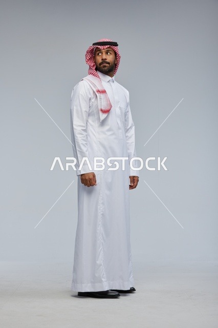 Saudi Man in Traditional Thobe and Shemagh Studio Shot