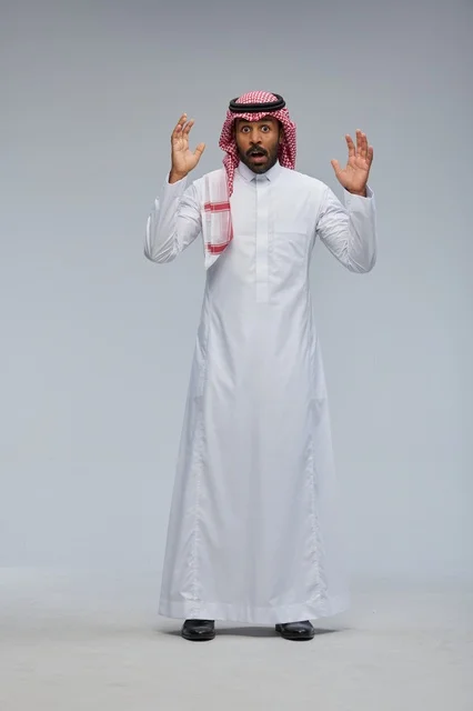 Surprised Saudi Man in Traditional Thobe and Shemagh