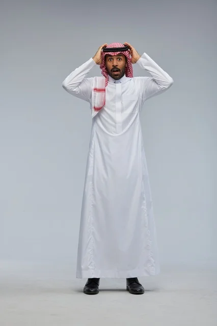 Shocked Saudi Man in Traditional Thobe Studio Portrait
