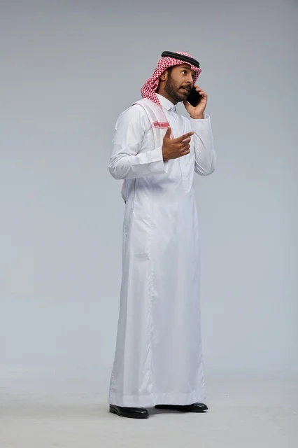 Saudi Man Talking on Smartphone in Studio