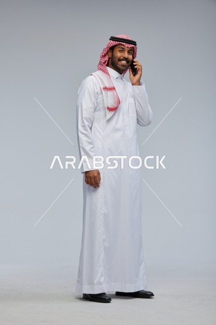 Saudi Man Talking on Smartphone in Studio