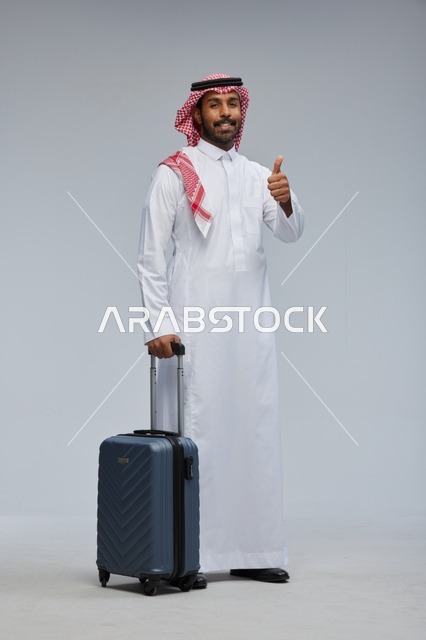 Saudi Man in Traditional Thobe with Travel Suitcase