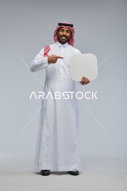 Saudi Man Holding Blank White Board in Studio