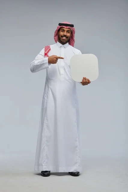 Saudi Man Holding Blank White Board in Studio